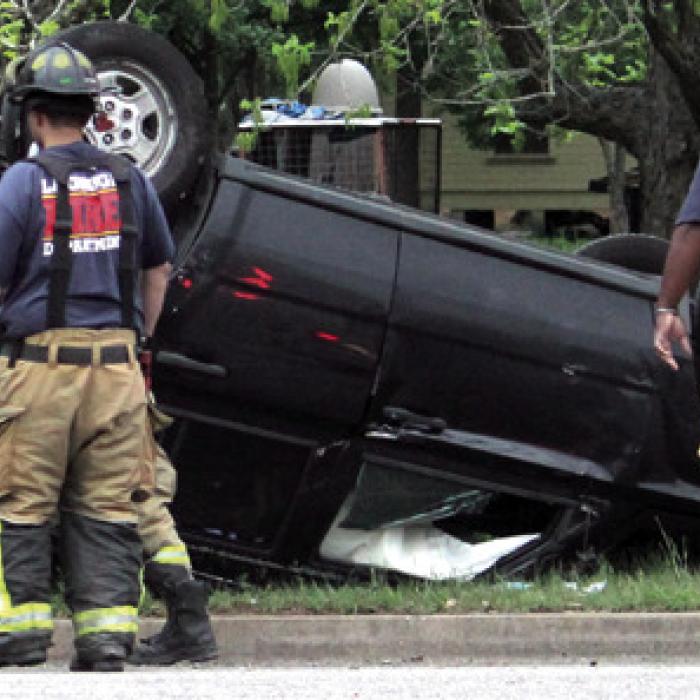 This scary scene looked worse than it was Sunday night when this west-bound Jeep collided with a south-bound Toyota pick-up that failed to yield the right of way at the intersection of Franklin and Live Oak Streets in La Grange across from the library. In the aftermath of the accident the Jeep, above, ended up upside down as responding La Grange firefighters arrived on the scene. No one was seriously injured. More details on the incident were not available at press time. Photo by Jeff Wick