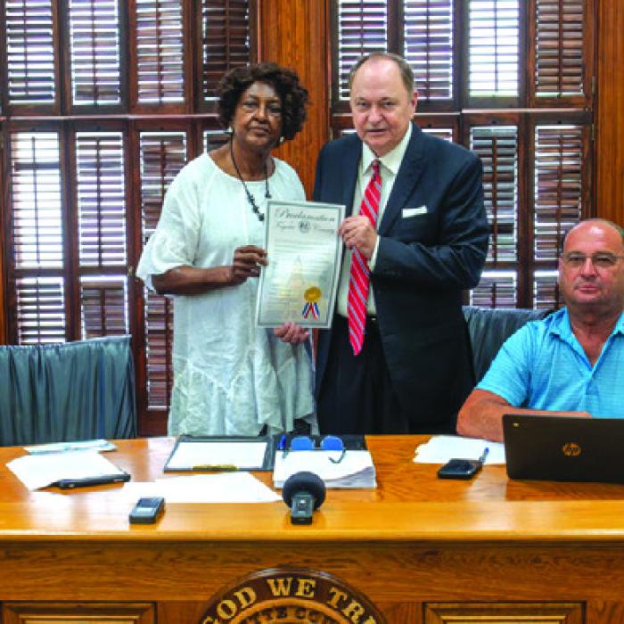 Fayette County Commissioners signed a proclamation designating June 19 as Emancipation Day in Fayette County. On hand for the signing was Verlia Mosley Rhodes, organizer of a local Juneteenth Celebration that will take place June 8 on the Courthouse Square. Pictured (from left) are Pct. 4 Commissioner Drew Brossmann, Rhodes, County Judge Dan Mueller, Pct. 2 Commissioner Luke Sternadel and Pct. 1 Commissioner Jason McBroom.