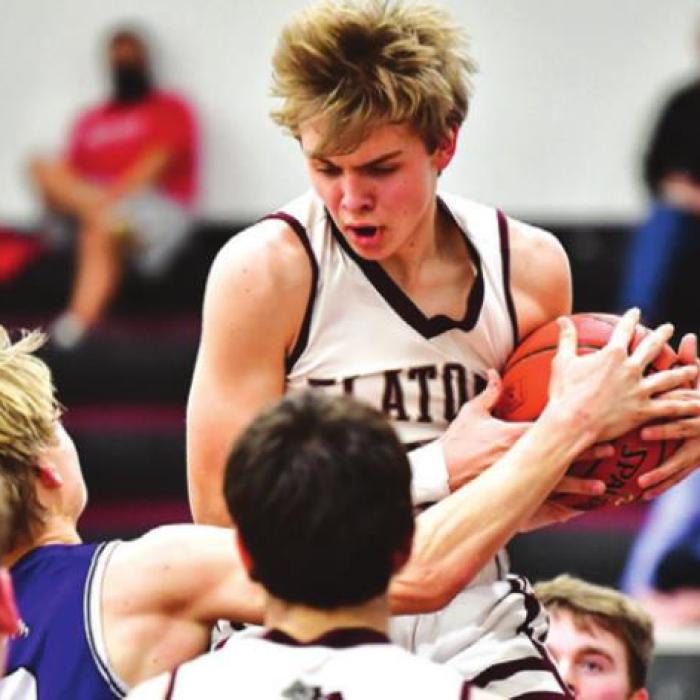 Flatonia’s Hagan Wagner secures the rebound for the Bulldogs in Monday night’s win over Thrall. Photo by Stephanie Steinhauser