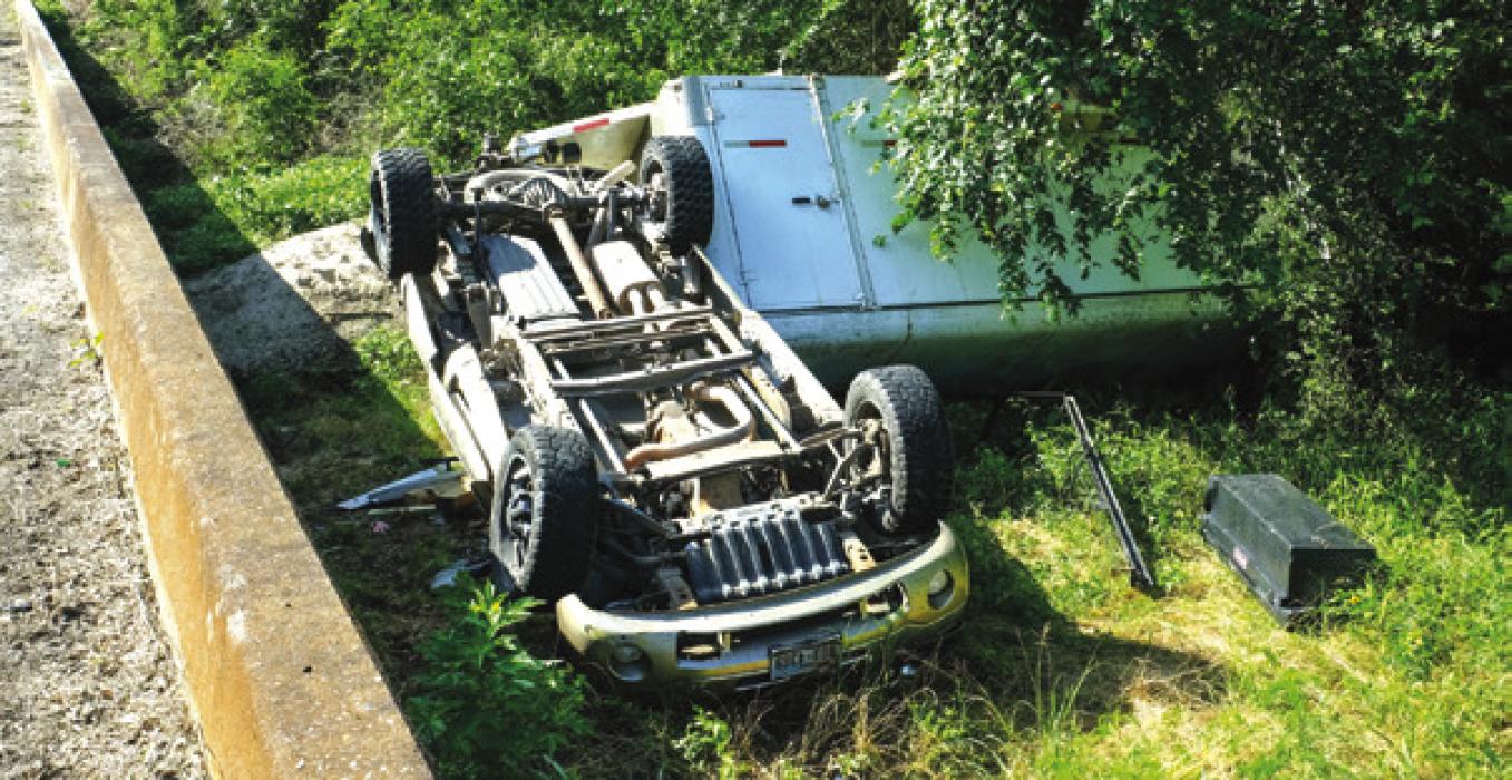 Object From One Vehicle  Sends Another Flying Off  Road and Into a Creek