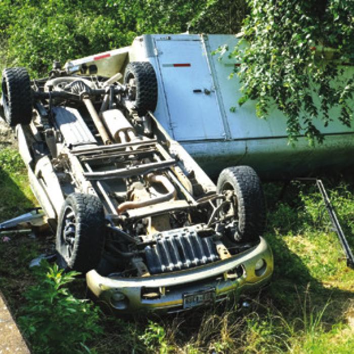 Object From One Vehicle  Sends Another Flying Off  Road and Into a Creek