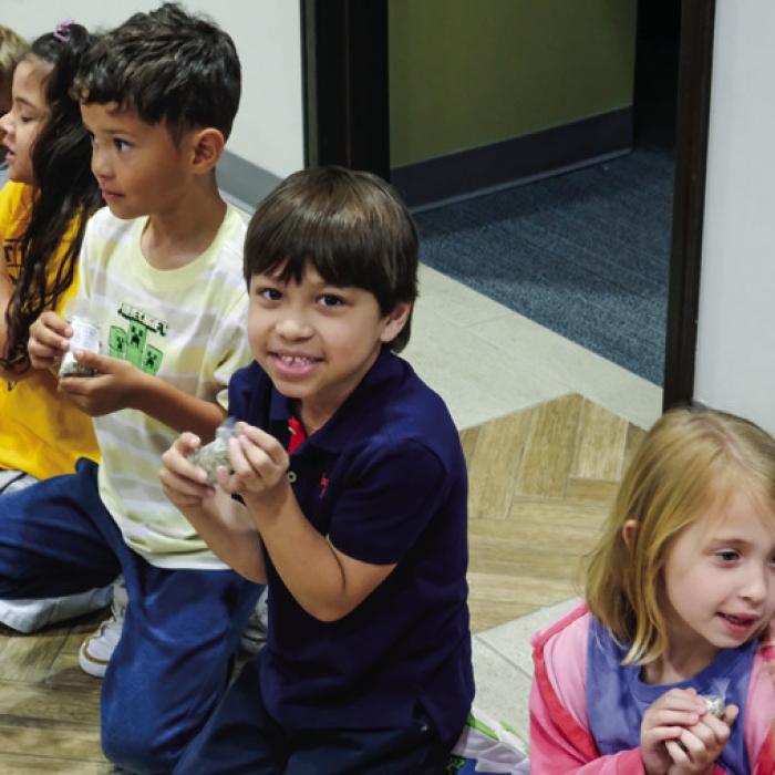 Each of the students received $80 worth of shredded paper money from the Federal Reserve Bank.