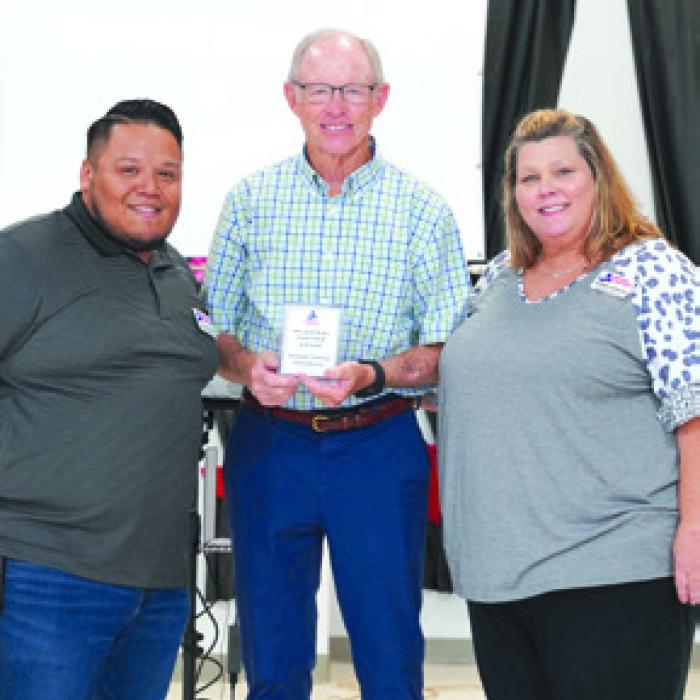 Above, the 2025 Milestone Partner Award Recipient: (from left) Josue Rivas, PAT Development Director; Bob Stanzel; and Karen Hoskins, PAT Program Director.
