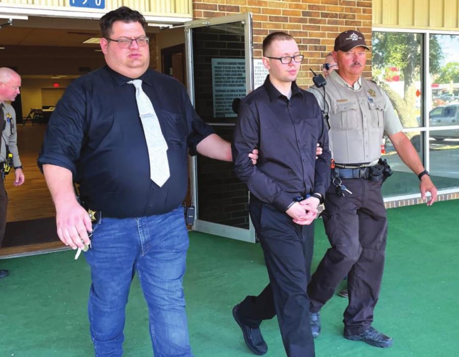 Fayette County Sheriff’s Deputies escort Dylan David Nelson out of the Knights of Columbus Hall in La Grange Friday after his the conclusion of his murder trial. The trial was held at the hall instead of the courthouse for social distancing purposes. Photo by Andy Behlen