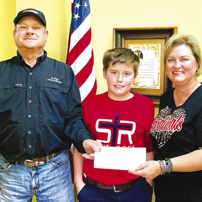 Pictured left to right is Roland Vacek, Nathan Vacek, and Jeannie Mican.