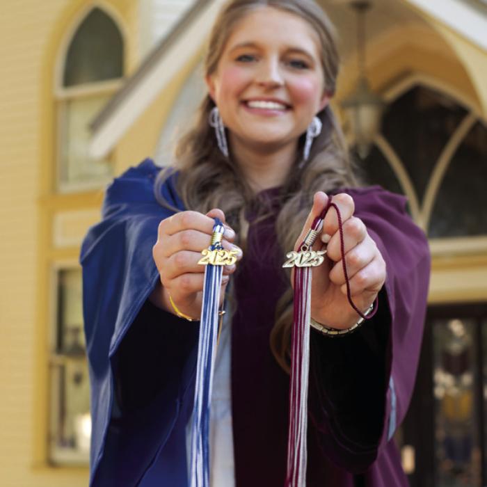 Reagan Moreau sporting both her Fayetteville maroon and Blinn blue.