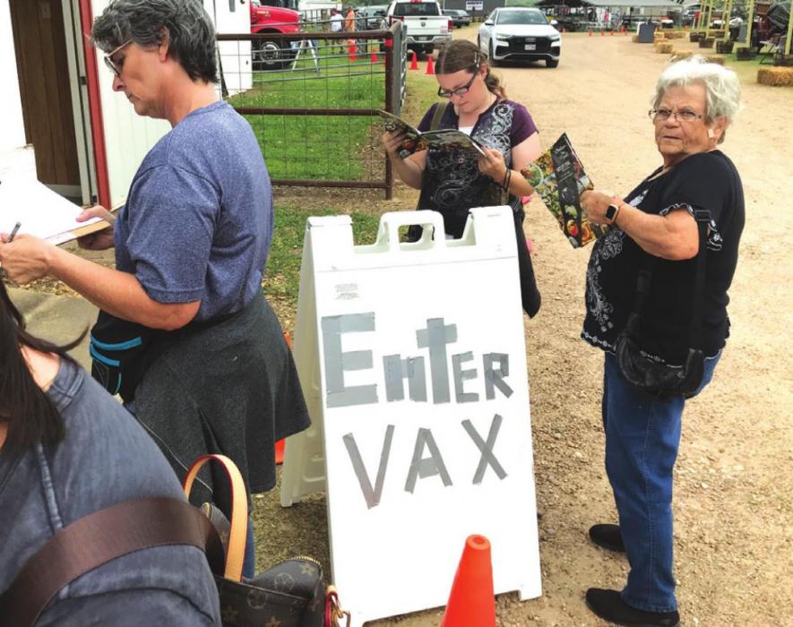 Images from the Warrenton Fire House, where a vaccine event was going on in the midst of the nation’s largest antiques festival.