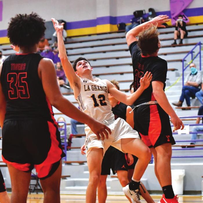 La Grange’s Caden Cooper throws up a shot against Smithville last week. Photo by Stephanie Steinhauser
