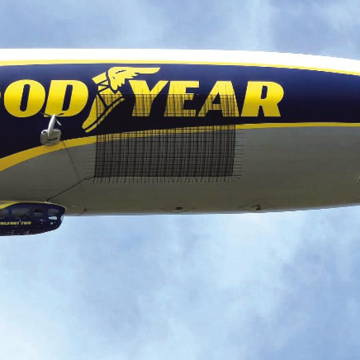 The Goodyear Blimp hovering over the airport. Photo by Stenton Maddox