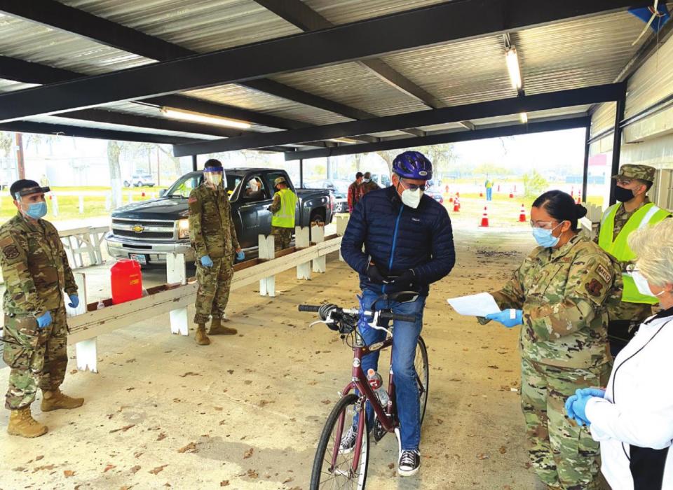 One person came through Monday’s COVID vaccine event at the Fayette County fairgrounds on a bicycle, another came via moped and two guys came through on a four-wheeler. Photo by Craig Moreau