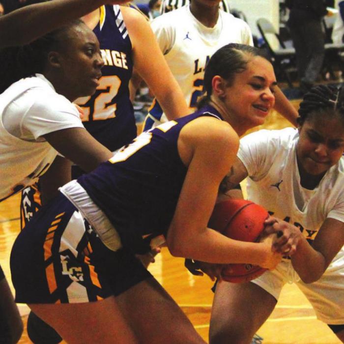 La Grange’s Camille Gonzalez fights for the ball Thursday.
