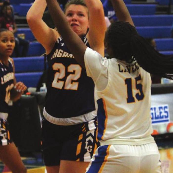 La Grange’s Ashlynn Golan goes to the basket with the ball Thursday.