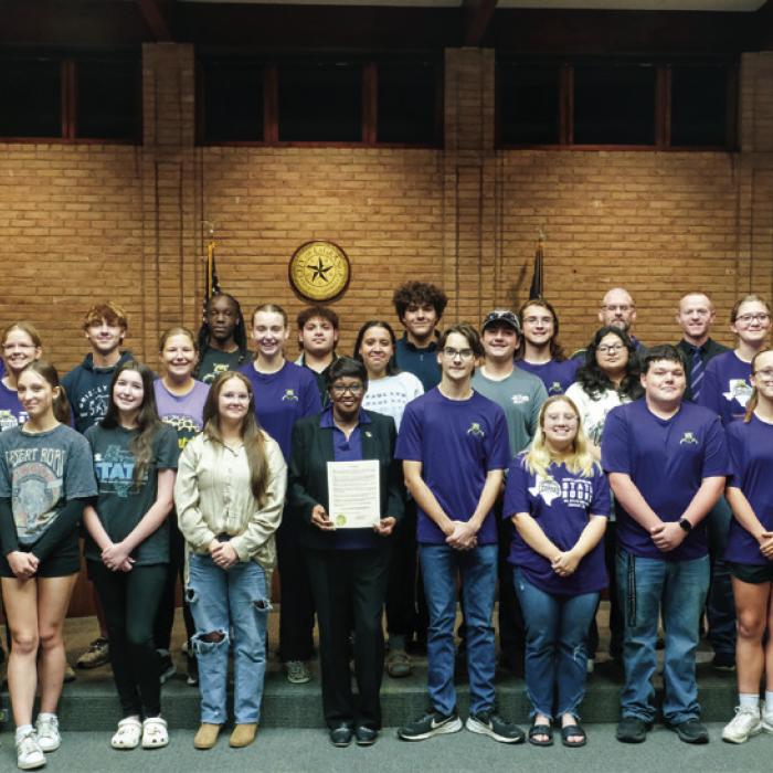 La Grange Mayor Jan Dockery signed a proclamation designating Nov. 25 as La Grange Leopards Marching Band Recognition Day. The Mighty Leopard Band made it all the way to the 4A State Marching Contest this year, which took place on Nov. 13. It was the first time for the La Grange Band to make it to the state contest. On hand for the proclamation signing at the City Council meeting Monday were directors and members of the Mighty Leopard Band. Staff photo by Andy Behlen
