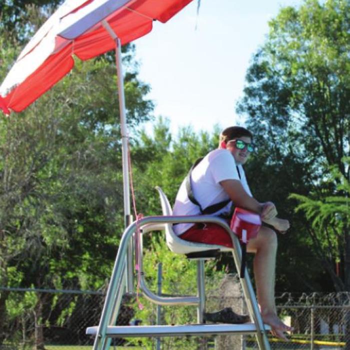 La Grange Lifeguard Tyson Roscher keeps his eyes on the pool.