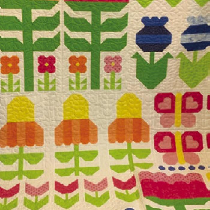 A local resident, Steve Kana from Schulenburg, is the 2026 Winner of The Best Little Quilt Show Raffle Quilt. Carol Kana pictured with “Flower Power”.