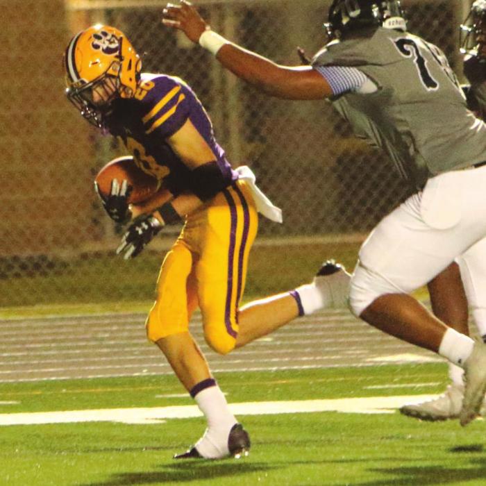 La Grange freshman Max Dixon intercepted two passes Thursday. He’s shown here returning one for a TD. Photo by Darrell D. Gest