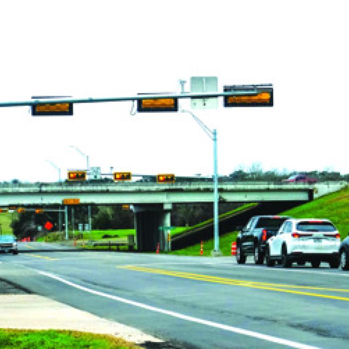 Traffic lights went up at the intersection of SH 159 and the Highway 71 Bypass in La Grange, the site of numerous accidents over the past few years.