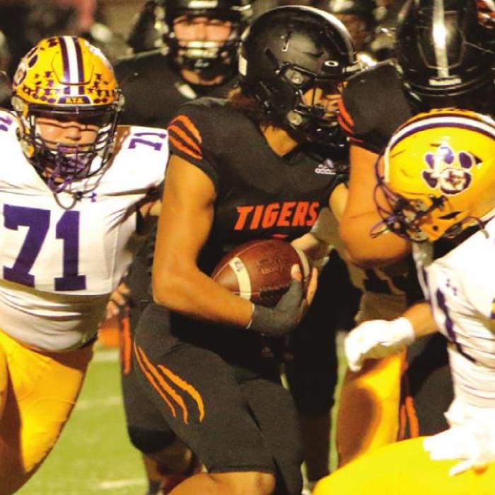La Grange’s Anthony Weikel (71) and Andrew Faske (11) on defense Friday. Photo by Darrell D. Gest