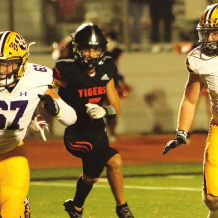 La Grange’s Cooper Imhoff blocks for his brother Ryder Friday. Photo by Darrell D. Gest