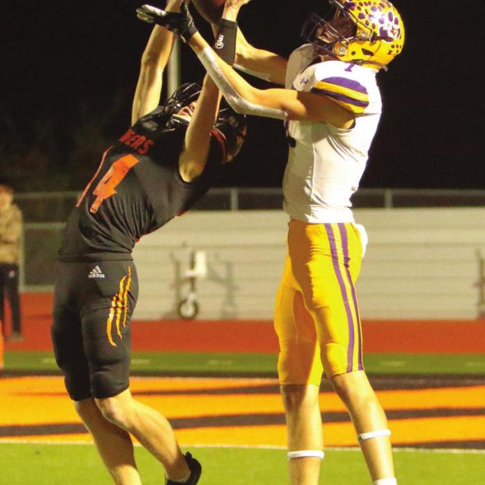 In the final seconds of the game, La Grange’s Jaxon Cooper somehow came down with this 36-yard catch despite good defense by Smithville. The catch set up the game’s final touchdown. Photo by Darrell D. Gest