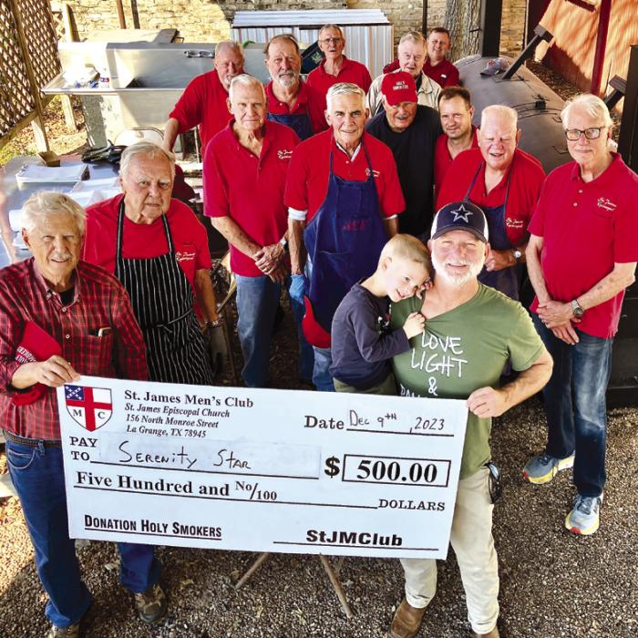 The Holy Smokers recently held a barbecue benefiting Serenity Star of Bastrop. Pictured front from left are: Dan Boyles, Sawyer Jones, Tut Jones, Director; middle row: Richard Dixon, Guy Mason, Jim Gilley, Tom Tracy, Jason Krupala, Bill Rugeley, and Jim Austin; back row: Mike Parrish, Larry Kahanek, Trey Cheatham, Paul Crane, and Brad Gibson.