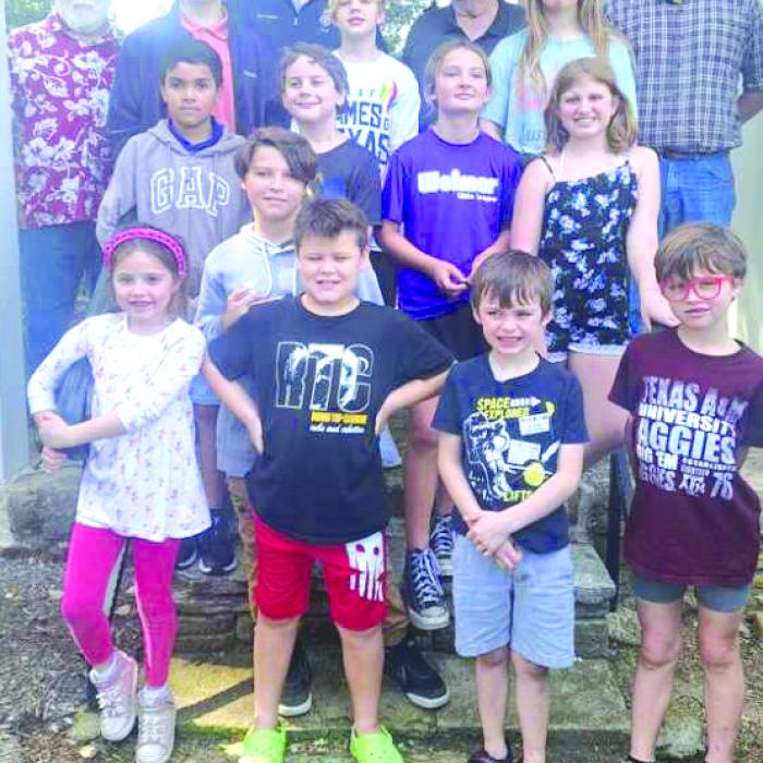 The Round Top Family Library hosted a chess tournament Nov. 4. Pictured front from left is: Macy Hodges, Nathan Johnson, Locus Johnson, Grady Rabb, Cole Hodges; middle row from left: Cazzanova Ramirez, Jeremy Choucnec, Korie Fogleman, Jaszelle Burns; back row from left: David McCall, tournament director, Joseph Rowland, Junior Division 1st place, Steven Choucnec-Senior Division 1st place, Garrison Ulrich, Clayton Beniguus, Jaszmyn Burns, and Stephen Rabb.