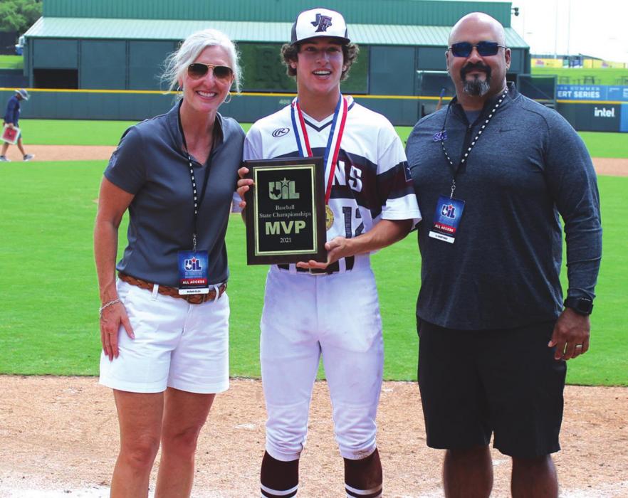 Fayetteville freshman pitcher Keagan Supak is presented the championship MVP award after the game Thursday. Supak pitched into the seventh inning, allowing six hits three runs and striking out six. He also drove in a run in the title game. Photo by Jeff Wick