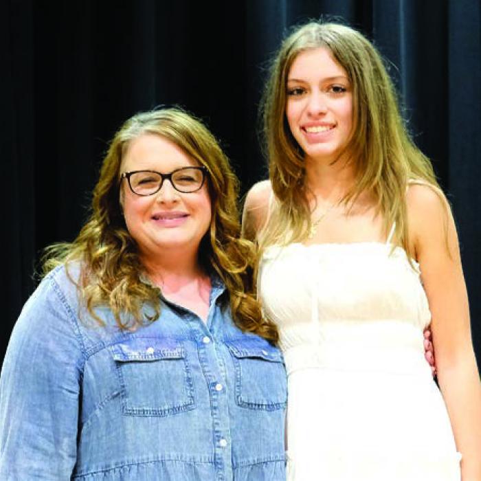 Anna Follin (right) plans to study journalism and public relations at The University of Texas at Austin. Her parents are Mary and Henrik Follin. She picked Casey Lewis-Wagner (left) as her favorite teacher.
