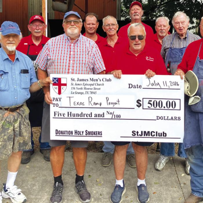 The St. James Men’s Club Holy Smokers recently cooked for the Fayette County Texas Ramp Project. Pictured second and fourth from left is John Marburger and Frank Smith of the Fayette County Texas Ramp Project surrounded by men of the Holy Smokers.