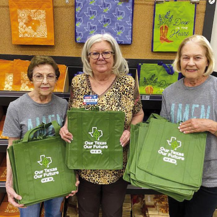 La Grange H-E-B donated 50 reusable bags to AMEN. Pictured left to right: Mary Vasek, AMEN board member; Diane Vollbaum, H-E-B Administrative Assistant; and Linda Oltmann, AMEN Board Member.