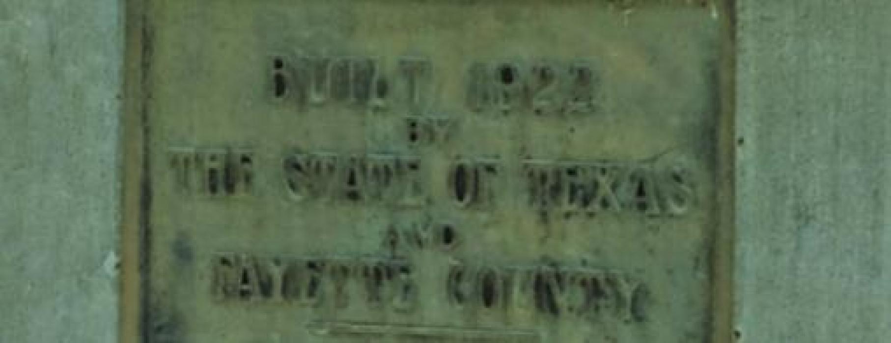 A plaque on the bridge crossing over the East Navidad River on FM 1579 still says “Built 1922 by The State of Texas and Fayette County.”