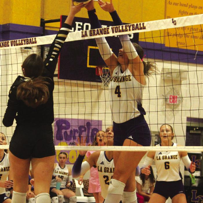 La Grange’s Avery Griffin, right, battles at the net against a Giddings player last Friday. Photo by Jeff Wick