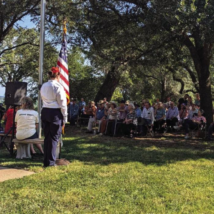 The annual Monument Hill Remembrance was held at Monument Hill State Historic Site on Saturday, Sept. 14. Visitors and descendants, above, participated in a solemn ceremony to commemorate the Dawson and Mier men entombed at the site. Costumed reenactors, (right) placed wreaths at the tomb as part of the ceremony. There were also special presentations at the Faison House Saturday. Photos courtesy of Gavin Miculka