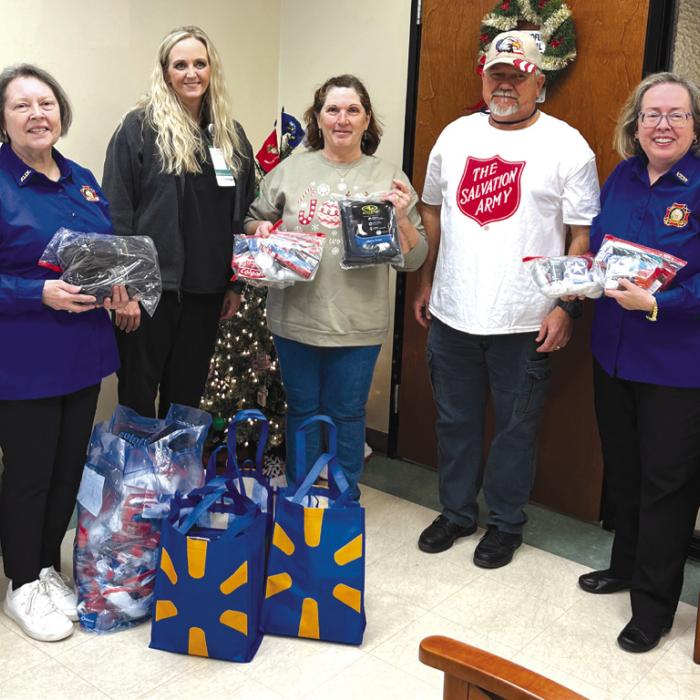 Pictured at the December donation for Veterans to the La Grange VA Clinic are VFW Auxiliary No. 5254 President Marilyn Kothmann, VA Clinic Primary Care Physician Karla Hinze, MD, VFW Auxiliary Junior Vice President and Veteran Outreach Program Chairman Becky Leer, Fayette County Veterans Service Officer and Salvation Army Director Jesse Lednicky, and VFW Auxiliary Secretary Elizabeth Kallus.
