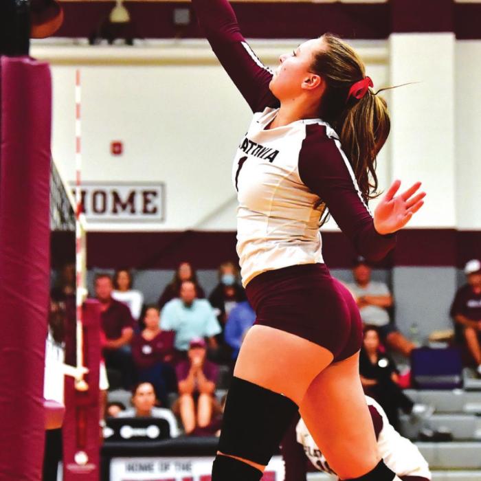 Ali Janecka guides the ball over the net for The Flatonia Lady Bulldogs in Tuesday night’s district thriller with Weimar. Photo by Stephanie Steinhauser