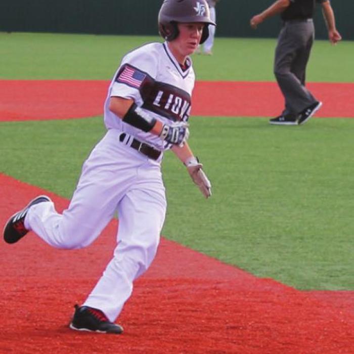 Fayetteville’s Reid Gross rounds third on his way to the Lions’ second run of the game.