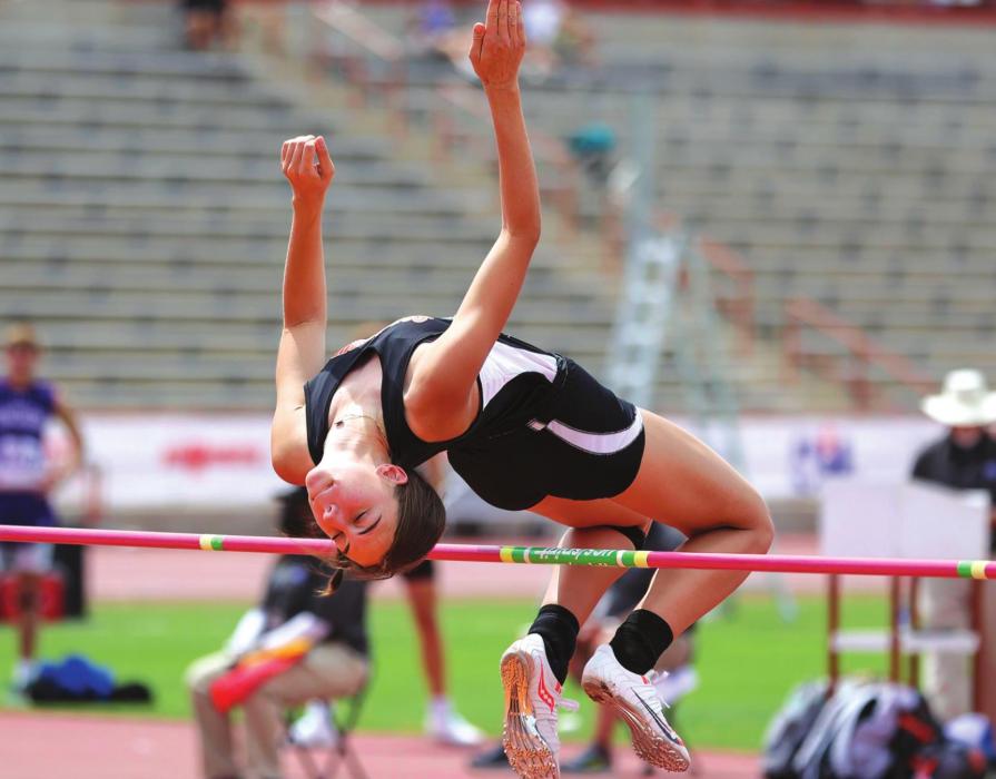 Schulenburg’s Meredith Magliolo is shown here on her way to a second place finish at state in the high jump. She cleared 5-feet, 3-inches to win silver. Photo by Scott Coleman