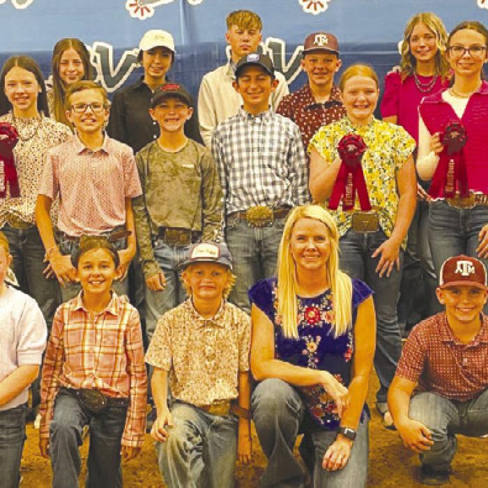 Pictured front from left: Abigale McBride, Emma Zweschper, Joe Carrales, Coach Kaci Carrales, Hudson Holub and Kinley Kutac Middle Row: Abraham McBride, Julia Melton, Alexis Berckenhoff , Tate Fritsch, Crockett Guenther, Dylan Zweschper, Kaisley Janecka, Tatum Fritsch, Adalyn Carrales, and Rilan Karisch Back Row: Rheagan Karisch, Laramie Laake, Logan Poncik, Addison Berckenhoff, Tori Newton, Kullen Kutac, Holden Holub, and Hailey Janish.
