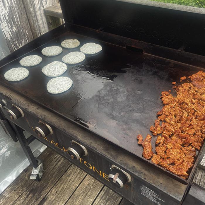I wanted to make tortillas, but my masa was a little too crumbly to form into a thin flatbread. Instead, I made it into gorditas that I stuffed with grilled pork.