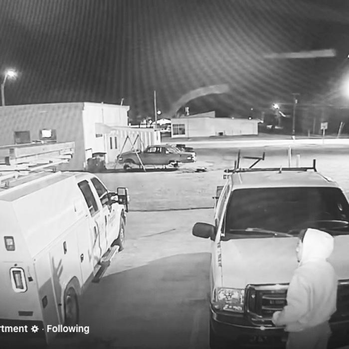 Surveillance video from a Schulenburg business shows one of the thieves just before they break into the work truck on the left early Monday morning, Dec. 29.