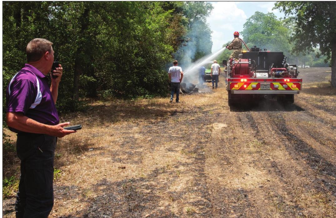 A fire near West Point burned about 2.5 acres on Friday afternoon, June 17. The fire started from a small pile of logs that the property owner burned and left unattended. Photo by Andy Behlen