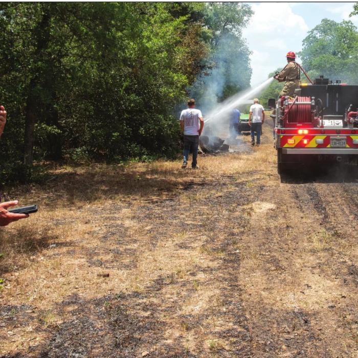 A fire near West Point burned about 2.5 acres on Friday afternoon, June 17. The fire started from a small pile of logs that the property owner burned and left unattended. Photo by Andy Behlen