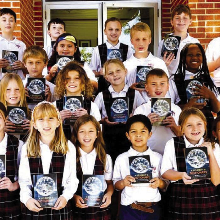 The Fayette County Republican Women organization visited the St. Rose of Lima Catholic School third grade class on Thursday, Nov. 14, and presented each student with a dictionary. The ladies briefly talked about how to find a word in the dictionary. They also showed the students how to use the book as a resource to learn a variety of facts, which will help them with their school subjects (math, science, social studies, and grammar), and real-life situations, such as, using sign language and braille.