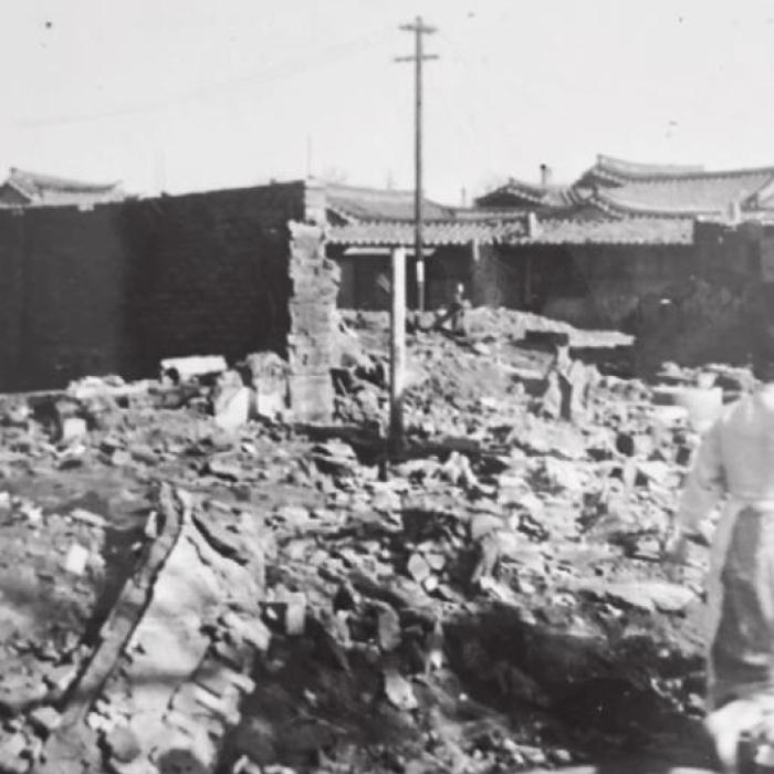 When he was stationed in Korea, Gene witnessed destruction in Seoul.