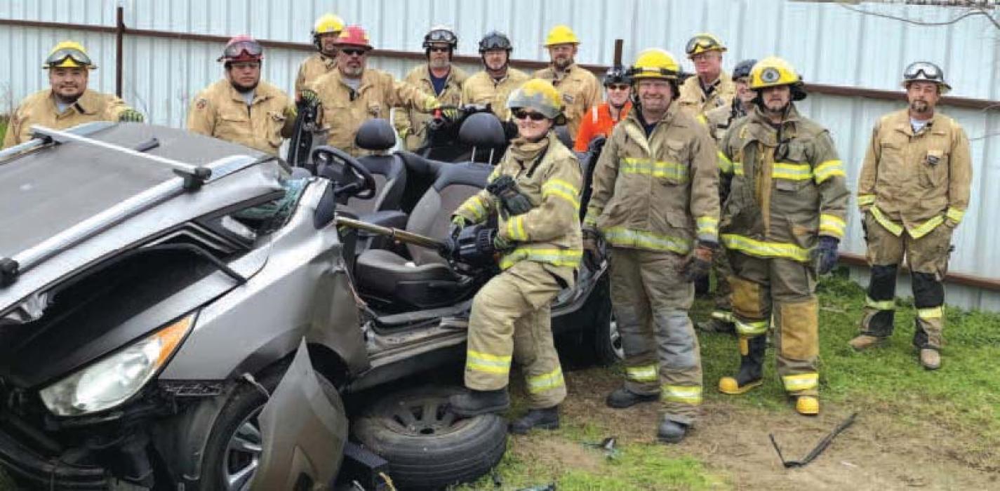 Above: A group working on vehicle extrication techniques and that class in action (right).
