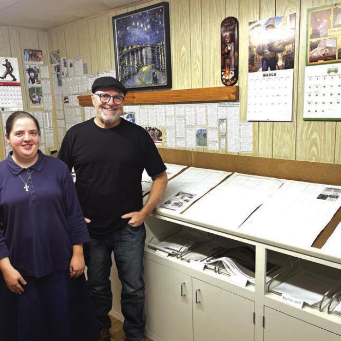 Melanie Berger, left, the editor of the Flatonia Argus newspaper, and Paul Prause, the owner/ publisher, in their newspaper office. Photo by Jeff Wick