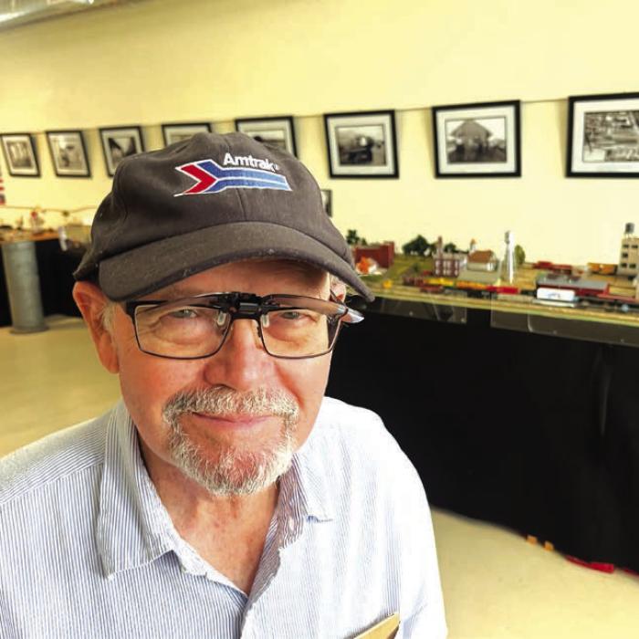 H.H. Howze sports a new Amtrak hat he bought at the Flatonia Rail Museum. For years Amtrak has considered adding a passenger train stop in Flatonia. Photo by Jeff Wick
