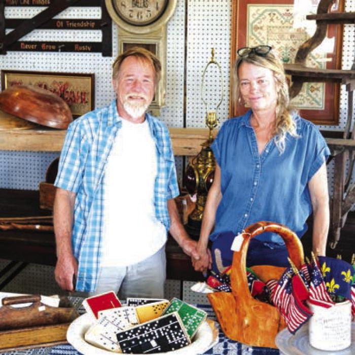 Gwen and Ken Freeman from Carmine, who have been selling a wide variety of antiques in the same spot for 15-16 years in Warrenton. Photo by Andy Behlen