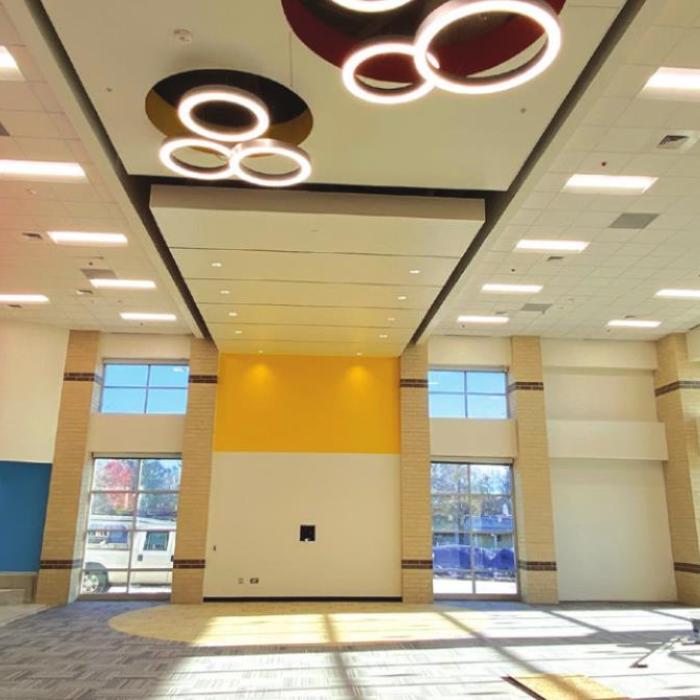 The only thing that’s still lacking from the almost finished library (above) in the new school are the books.