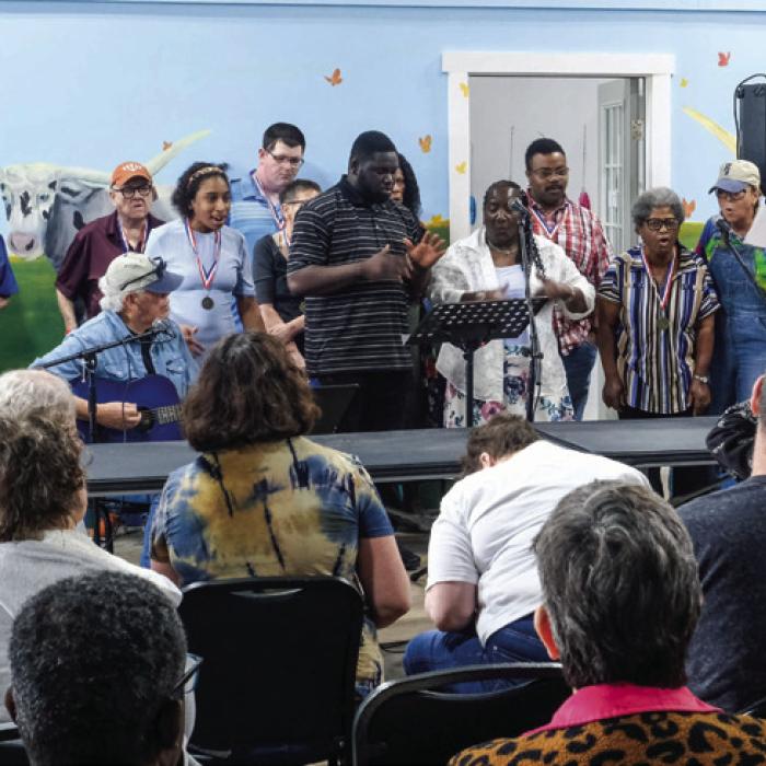 Clients of Gray Legacy Services perform in a concert last Thursday as part of the SongBuddies workshop featuring Terri Hendrix and Lloyd Maines. Photo by Andy Behlen